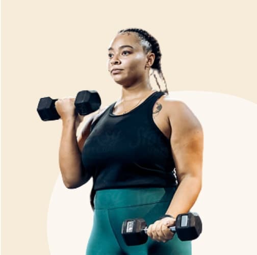 Woman lifting dumbbell weights