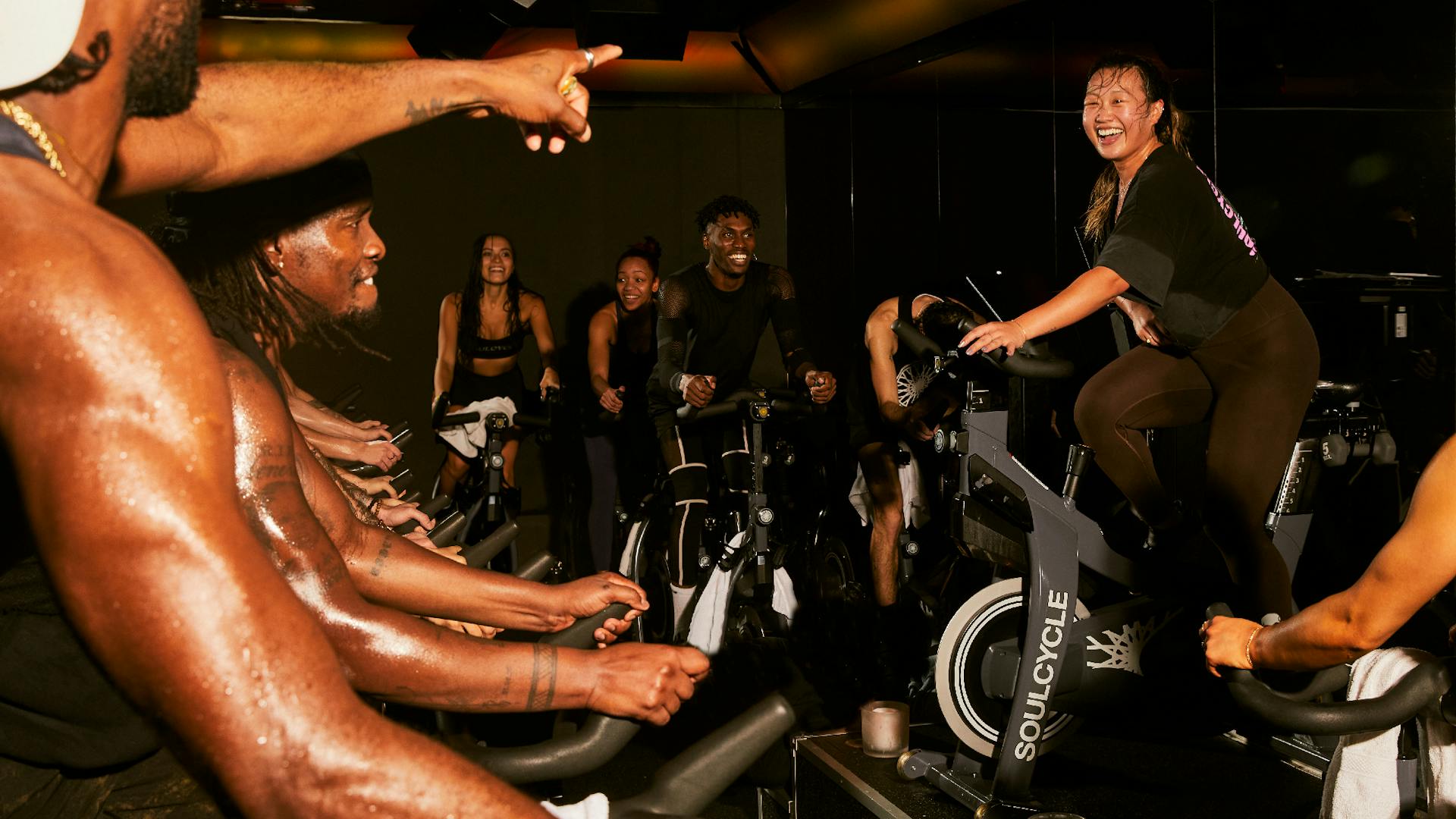 People riding in a SoulCycle class